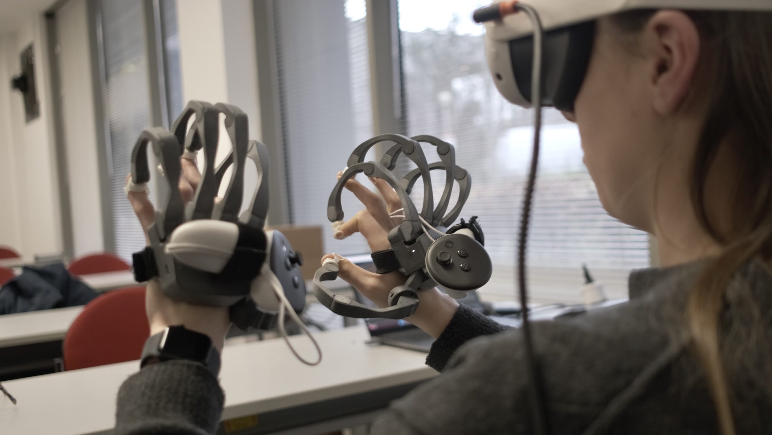 Haptikos Announces Low-Cost Hand Exoskeleton and AI-Infused, Licensable XR Operating System

